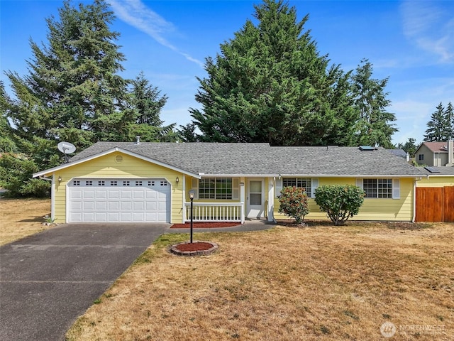 3117 243rd Street Ct E, Spanaway, WA 98387 - single story home with driveway, a garage, and covered porch