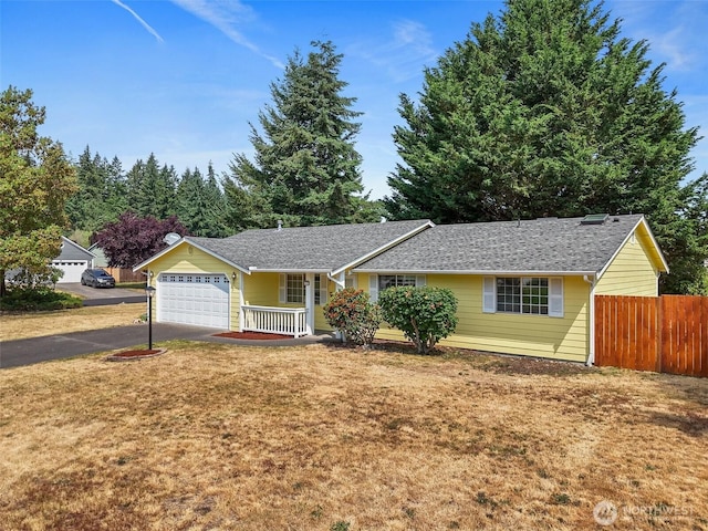 3117 243rd Street Ct E, Spanaway, WA 98387 - ranch-style home featuring a garage, driveway, and a porch