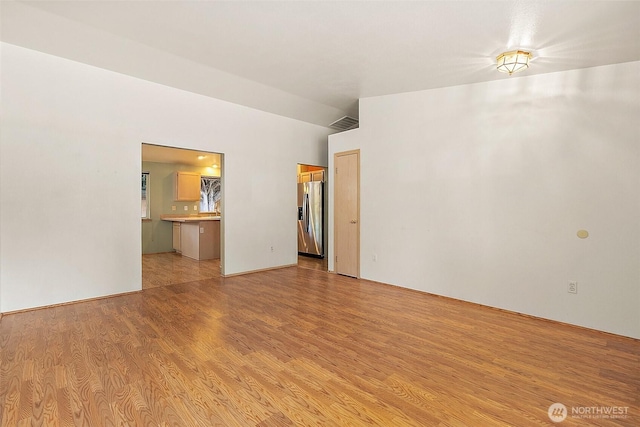 3117 243rd Street Ct E, Spanaway, WA 98387 - spare room featuring light wood finished floors