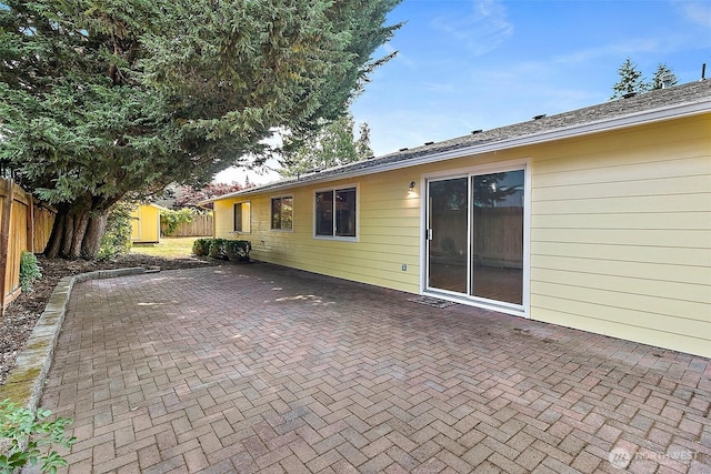 3117 243rd Street Ct E, Spanaway, WA 98387 - fenced backyard with a patio area and a shed