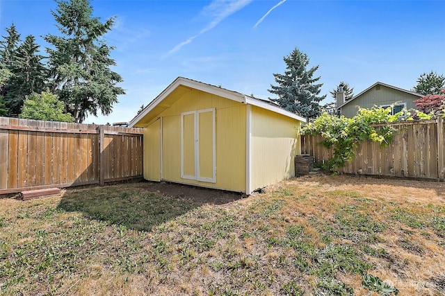 3117 243rd Street Ct E, Spanaway, WA 98387 - view of shed with a fenced backyard
