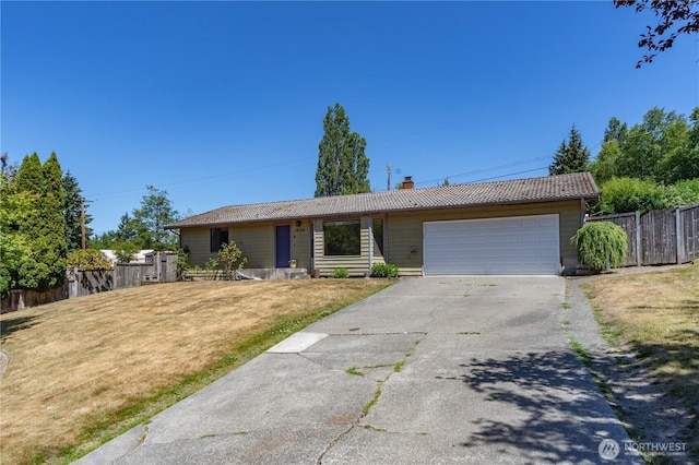 18552 15th Loop NE, Poulsbo, WA 98370 - ranch-style house with an attached garage, driveway, and a chimney