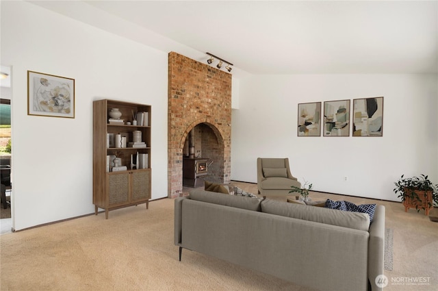 18552 15th Loop NE, Poulsbo, WA 98370 - living area featuring light colored carpet, track lighting, and vaulted ceiling
