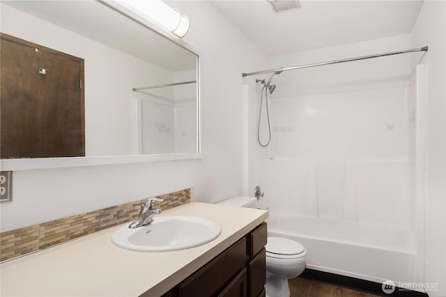 18552 15th Loop NE, Poulsbo, WA 98370 - bathroom featuring vanity, tasteful backsplash, and shower / bath combination