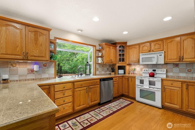 44520 SE 144th St, North Bend, WA 98045 - kitchen featuring white appliances, open shelves, light countertops, backsplash, and recessed lighting