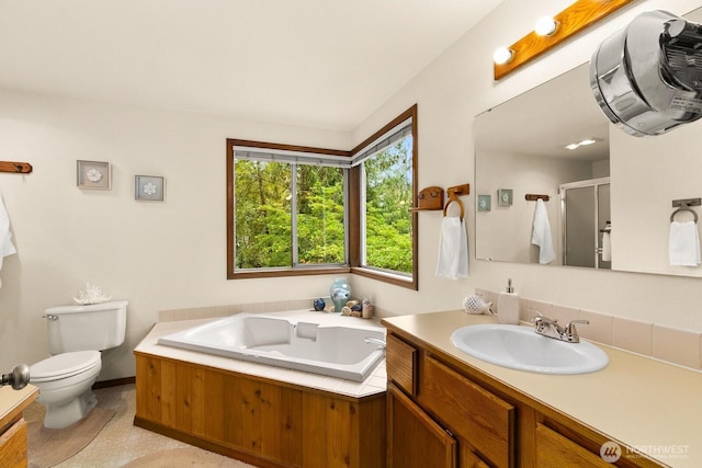 44520 SE 144th St, North Bend, WA 98045 - bathroom featuring vanity, a stall shower, and a garden tub