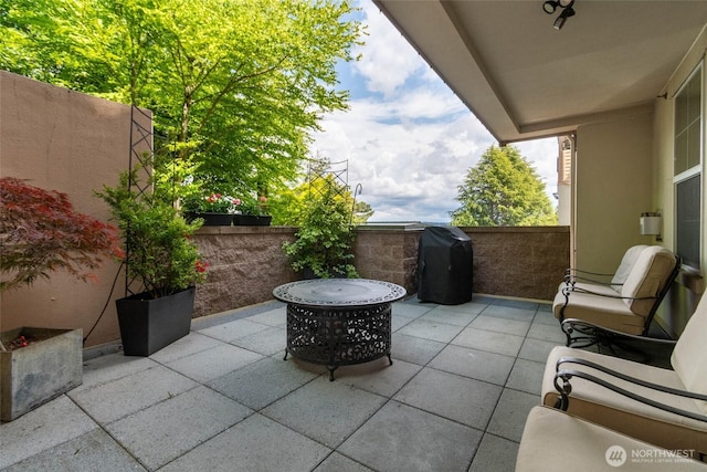 7549 SE 29th St Unit 301, Mercer Island, WA 98040 - view of patio with a grill