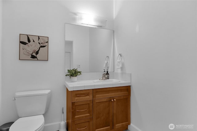 7549 SE 29th St Unit 301, Mercer Island, WA 98040 - bathroom with baseboards and vanity