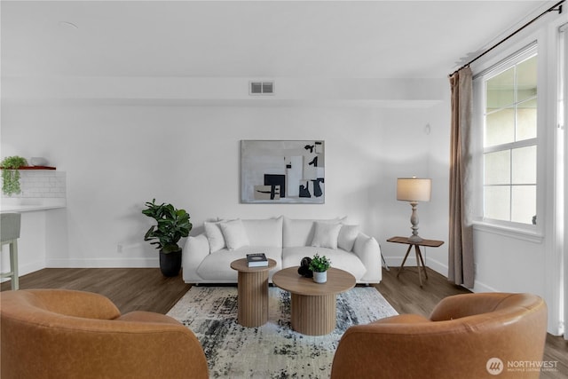 7549 SE 29th St Unit 301, Mercer Island, WA 98040 - living area featuring wood finished floors and healthy amount of natural light