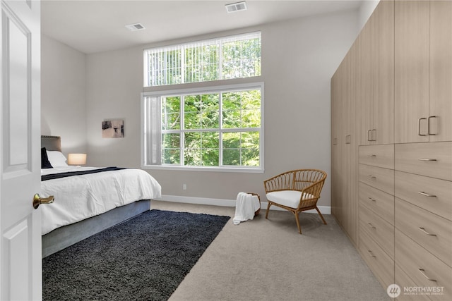7549 SE 29th St Unit 301, Mercer Island, WA 98040 - bedroom featuring light colored carpet and baseboards