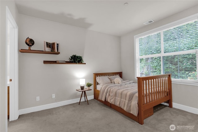 7549 SE 29th St Unit 301, Mercer Island, WA 98040 - bedroom with multiple windows and carpet