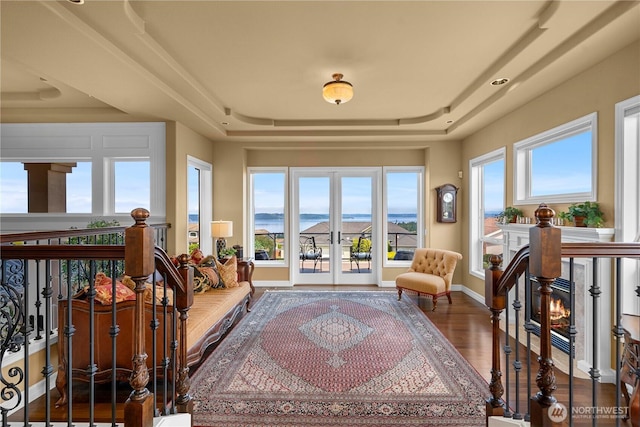 2014 Parkview Dr NE, Tacoma, WA 98422 - sunroom featuring french doors, plenty of natural light, and a water view