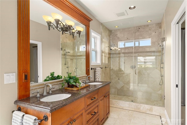 2014 Parkview Dr NE, Tacoma, WA 98422 - full bath with a shower stall, double vanity, tile patterned floors, and a chandelier