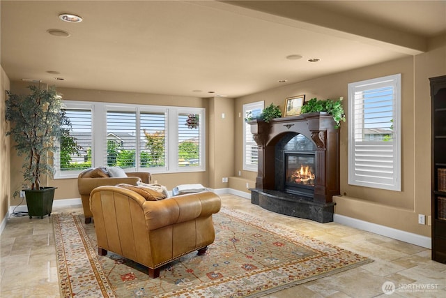 2014 Parkview Dr NE, Tacoma, WA 98422 - living room featuring a high end fireplace, light stone finish floors, and recessed lighting