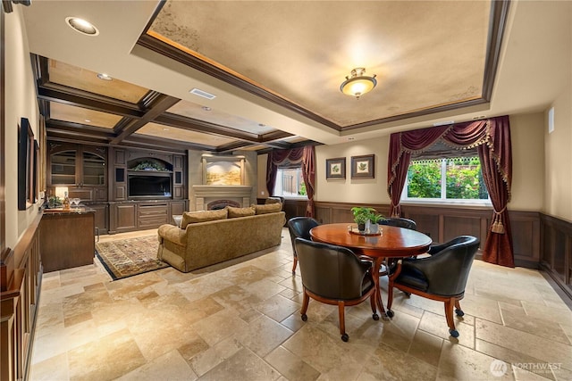 2014 Parkview Dr NE, Tacoma, WA 98422 - dining space with stone tile floors, wainscoting, recessed lighting, a fireplace, and beamed ceiling
