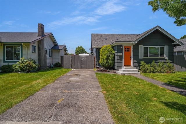 467 22nd Ave, Longview, WA 98632 - bungalow featuring a gate, a chimney, driveway, and roof with shingles