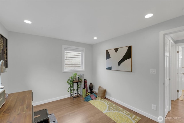 8410 9th Ave SW, Seattle, WA 98106 - home office with wood finished floors and recessed lighting