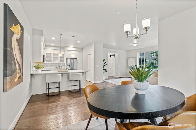 15791 NE 114th Way, Redmond, WA 98052 - dining room featuring recessed lighting, a chandelier, and dark wood-style floors