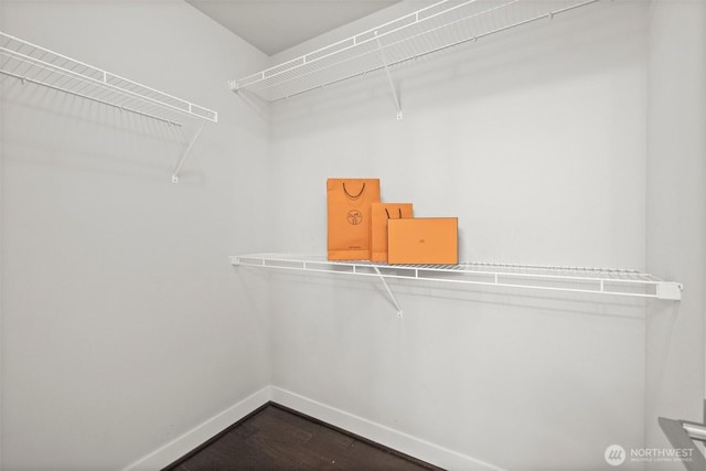 15791 NE 114th Way, Redmond, WA 98052 - walk in closet featuring dark wood-style floors