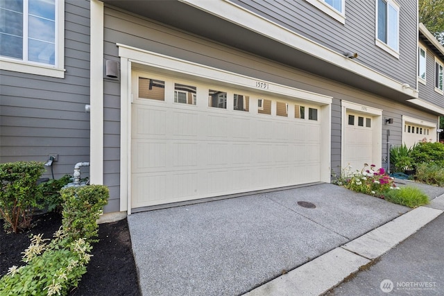 15791 NE 114th Way, Redmond, WA 98052 - garage featuring concrete driveway