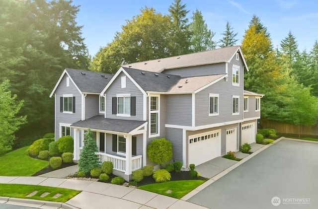 15791 NE 114th Way, Redmond, WA 98052 - view of front of property featuring a porch, an attached garage, driveway, and roof with shingles