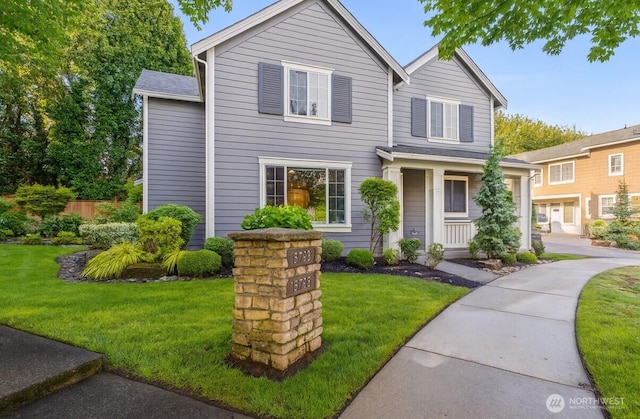 15791 NE 114th Way, Redmond, WA 98052 - traditional-style house with a front yard and a porch