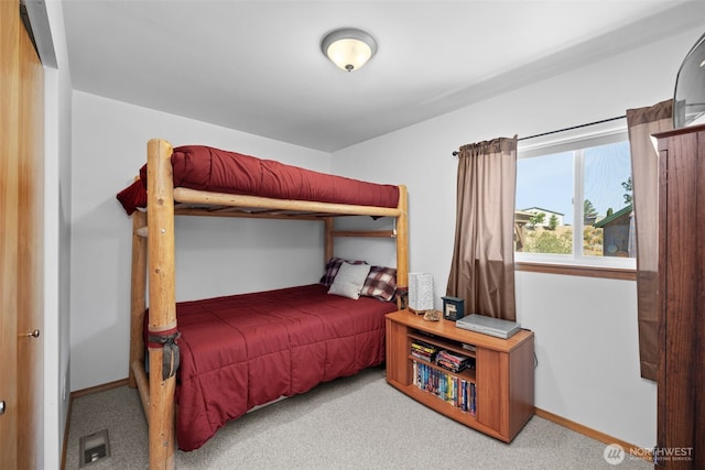 144 W Airport Loop, Seven Bays, WA 99122 - carpeted bedroom featuring baseboards