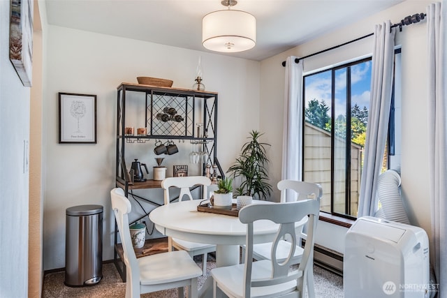 1102 8th St NE Unit 22, Auburn, WA 98002 - dining area with baseboards