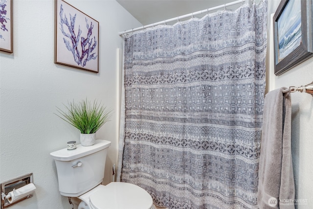 1102 8th St NE Unit 22, Auburn, WA 98002 - bathroom featuring toilet and a shower with shower curtain