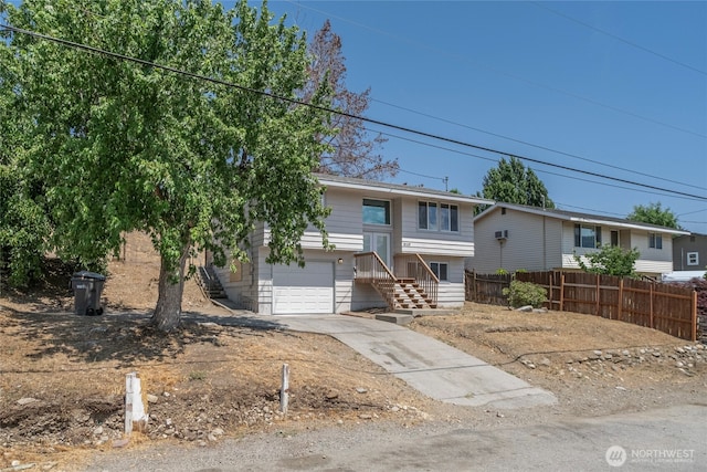 2117 S Majestic Dr, East Wenatchee, WA 98802 - raised ranch with driveway and an attached garage