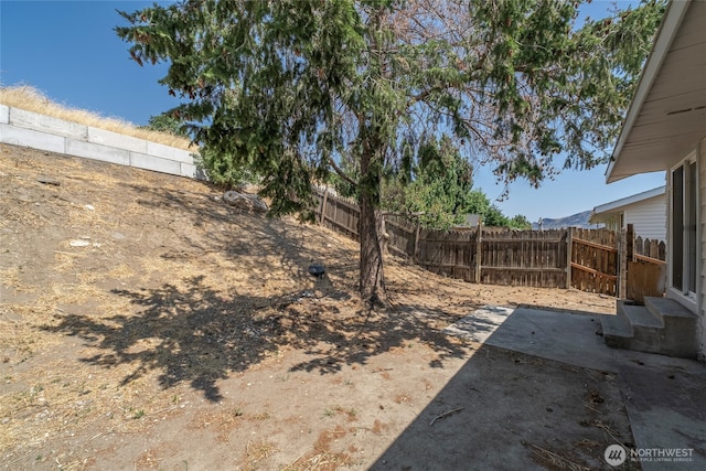 2117 S Majestic Dr, East Wenatchee, WA 98802 - fenced backyard featuring a patio area