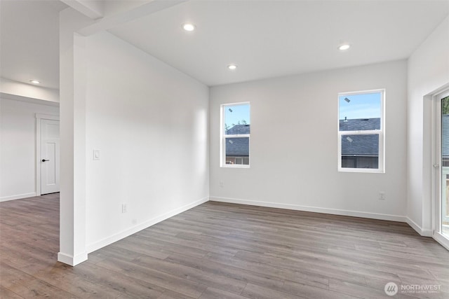7812 S Sheridan Ave, Tacoma, WA 98408 - spare room with wood finished floors and recessed lighting