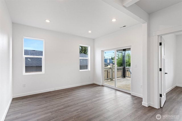 7812 S Sheridan Ave, Tacoma, WA 98408 - unfurnished room featuring dark wood-style floors and recessed lighting