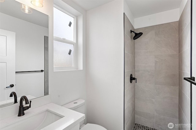 7812 S Sheridan Ave, Tacoma, WA 98408 - bathroom featuring a tile shower and vanity