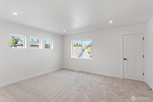 7812 S Sheridan Ave, Tacoma, WA 98408 - spare room featuring light colored carpet and recessed lighting