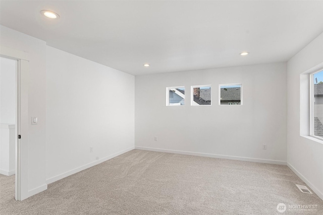 7812 S Sheridan Ave, Tacoma, WA 98408 - spare room featuring light colored carpet and recessed lighting