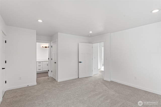 7812 S Sheridan Ave, Tacoma, WA 98408 - unfurnished bedroom featuring light carpet, recessed lighting, and connected bathroom