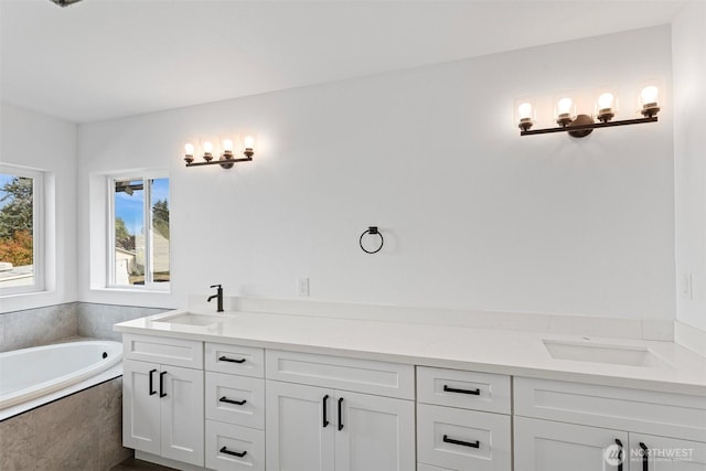 7812 S Sheridan Ave, Tacoma, WA 98408 - full bathroom featuring double vanity and a bath