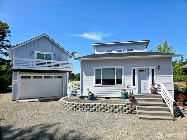 410 Eddy Ct, Port Townsend, WA 98368 - view of front of home with a balcony and board and batten siding