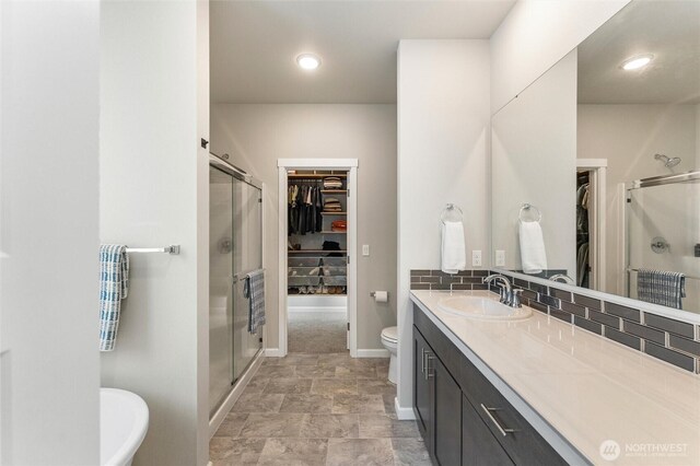 16712 8th Ave E, Spanaway, WA 98387 - bathroom with a spacious closet and a stall shower