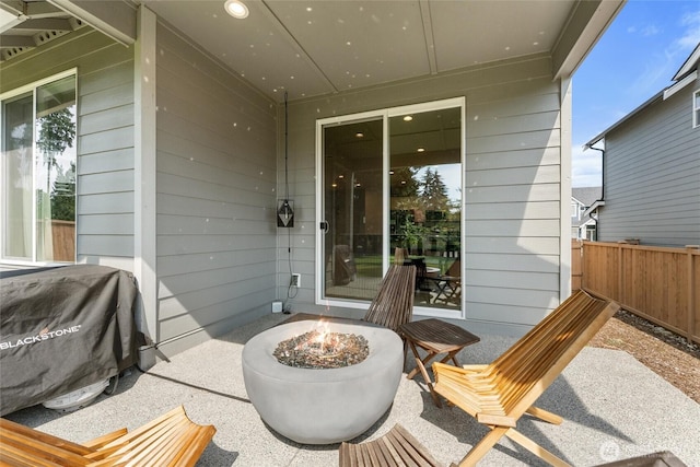 16712 8th Ave E, Spanaway, WA 98387 - view of patio featuring an outdoor fire pit and a grill