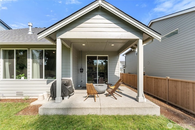 16712 8th Ave E, Spanaway, WA 98387 - back of property featuring a patio area, roof with shingles, and crawl space