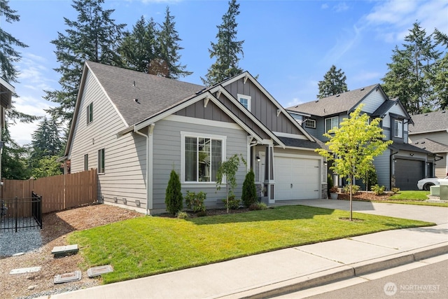 16712 8th Ave E, Spanaway, WA 98387 - craftsman house featuring board and batten siding, concrete driveway, a garage, and roof with shingles