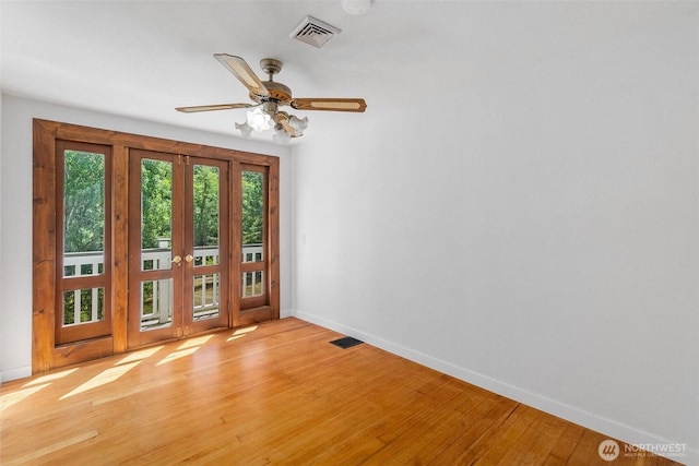 6928 View Park Rd SE, Port Orchard, WA 98367 - unfurnished room with light wood-type flooring and ceiling fan