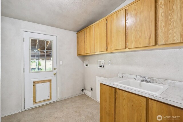 801 Hemlock Rd, Carson, WA 98610 - laundry room featuring hookup for a washing machine, cabinet space, hookup for an electric dryer, and a textured ceiling