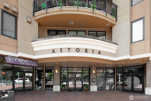 10047 Main St Unit 319, Bellevue, WA 98004 - entrance to property with a balcony and french doors