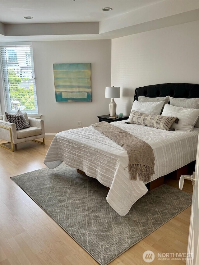 10047 Main St Unit 319, Bellevue, WA 98004 - bedroom with wood finished floors