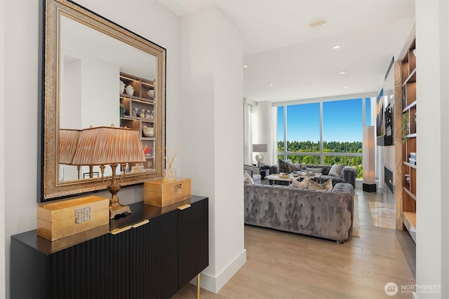 10650 NE 9th Pl Unit 2524, Bellevue, WA 98004 - corridor featuring light wood-style floors and recessed lighting