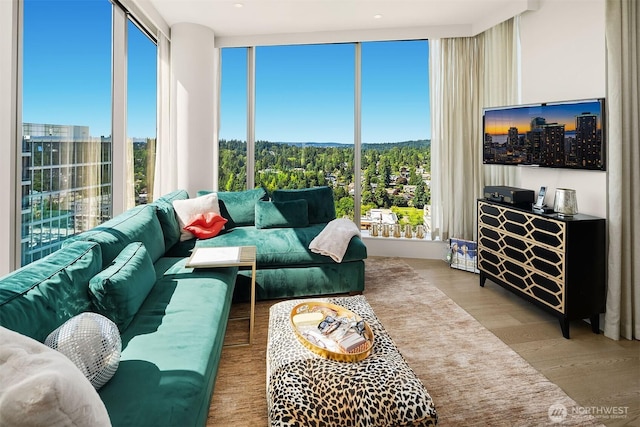 10650 NE 9th Pl Unit 2524, Bellevue, WA 98004 - living area featuring wood finished floors and a wall of windows