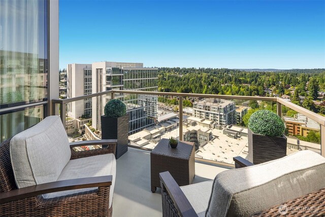 10650 NE 9th Pl Unit 2524, Bellevue, WA 98004 - balcony with a forest view
